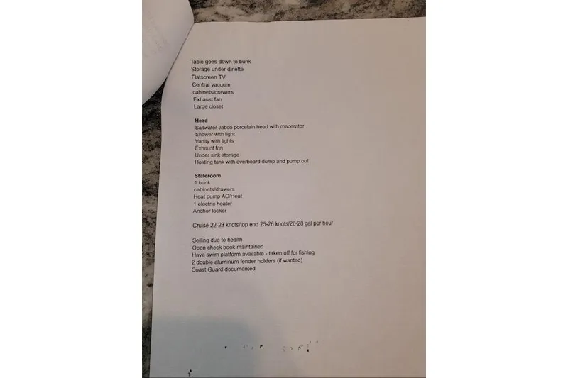 Slide: The Image of Text document listing features of a 1989 Viking 41 Convertible boat. - 10