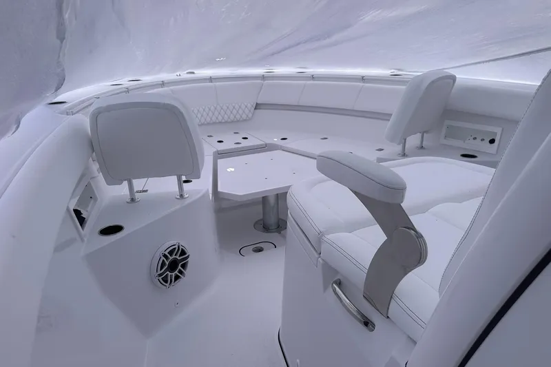 Slide: The Image of 2026 Sportsman Heritage 321 Center Console interior with white seating and modern design. - 27