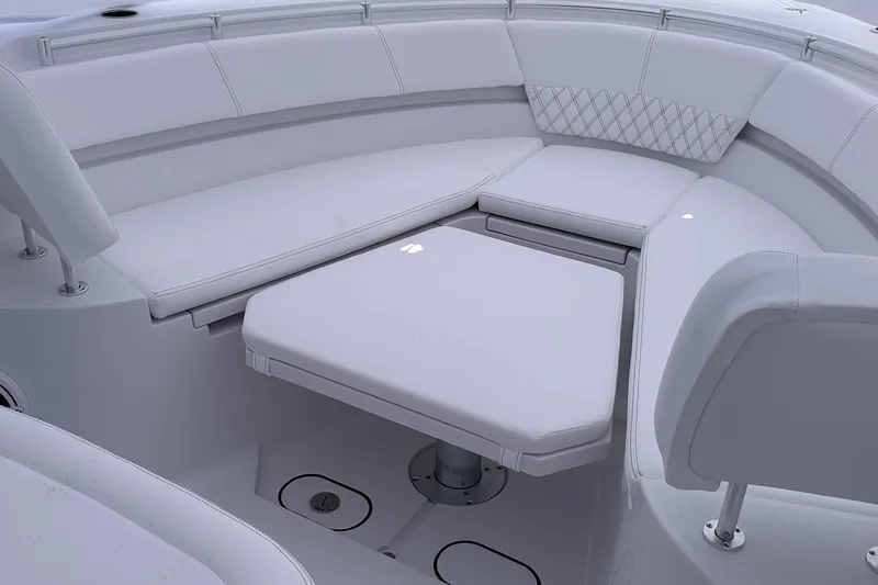 Slide: The Image of 2026 Sportsman Heritage 321 Center Console boat interior with cushioned seating. - 47