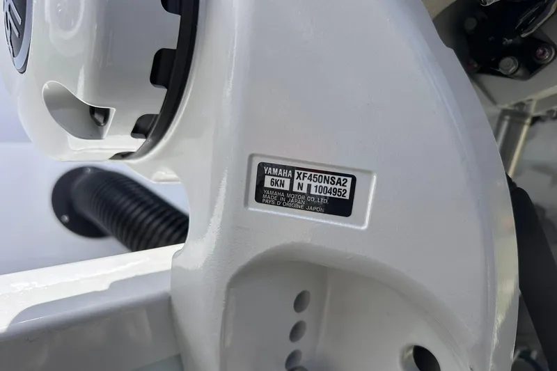 Slide: The Image of Close-up of Yamaha motor label on 2026 Sportsman Heritage 321 Center Console boat. - 5