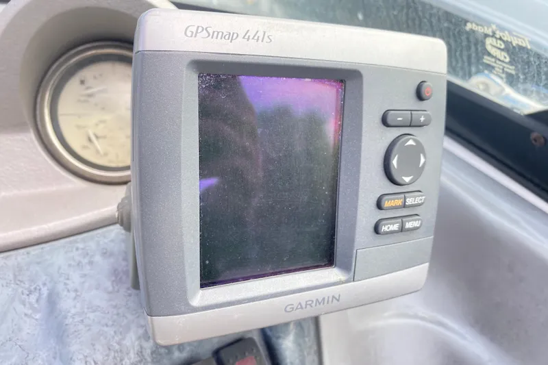 Slide: The Image of Garmin GPSmap 441s device on a 2007 Monterey 234FSX boat dashboard. - 15