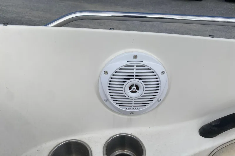Slide: The Image of Kenwood speaker on 2007 Monterey 234FSX boat, with stainless steel cup holders. - 20