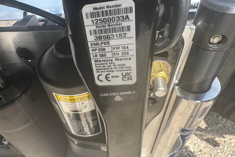 Slide: The Image of Close-up of Mercury Marine engine label on 2026 Phoenix 721 ZXL boat. - 11