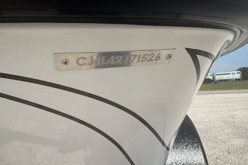 Slide: The Image of 2026 Phoenix 721 ZXL boat hull with identification number plate. - 12