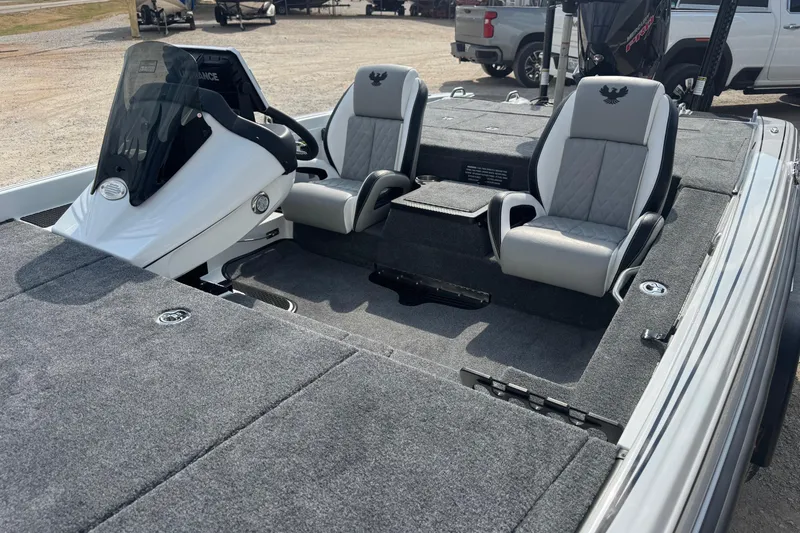 Slide: The Image of 2026 Phoenix 721 ZXL boat interior with dual seats and steering console. - 6
