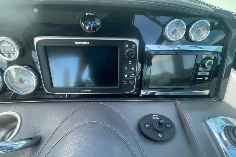 Slide: The Image of Dashboard of a 2016 Formula 310 Bowrider with Raymarine navigation system. - 40