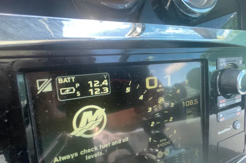 Slide: The Image of Dashboard of a 2016 Formula 310 Bowrider showing battery voltage and speed. - 42