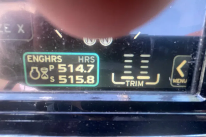 Slide: The Image of Close-up of a 2016 Formula 310 Bowrider engine hours display showing 514.7 and 515.8 hours. - 43