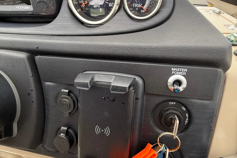 Slide: The Image of Dashboard of 2025 Berkshire 24RFC CTS 2.75 with gauges, power switch, and ignition keys. - 10