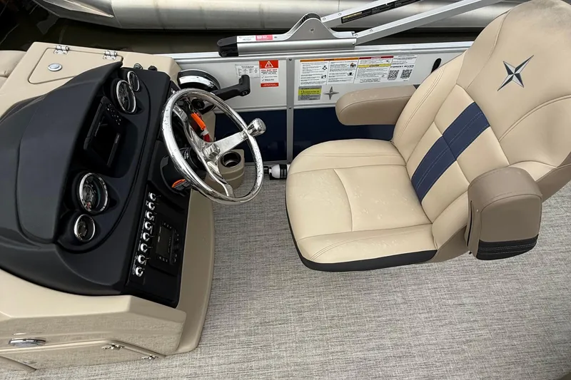 Slide: The Image of Captain's chair and helm of 2025 Berkshire 24RFC CTS 2.75 pontoon boat. - 8