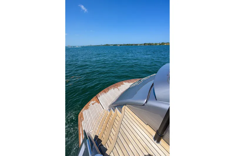 Slide: The Image of Aerial view of 2022 Pershing 9X yacht with spacious deck and seating area. - 21