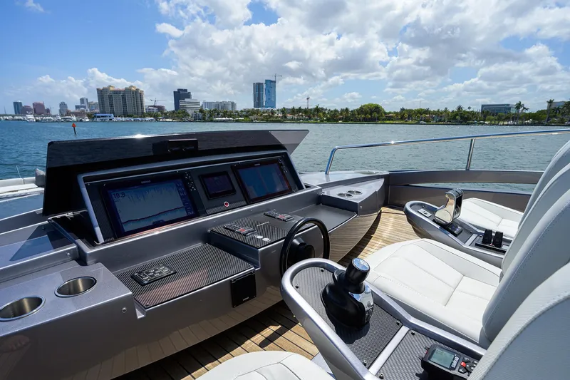 Slide: The Image of Luxurious 2022 Pershing 9X yacht deck with elegant seating and ocean view. - 29