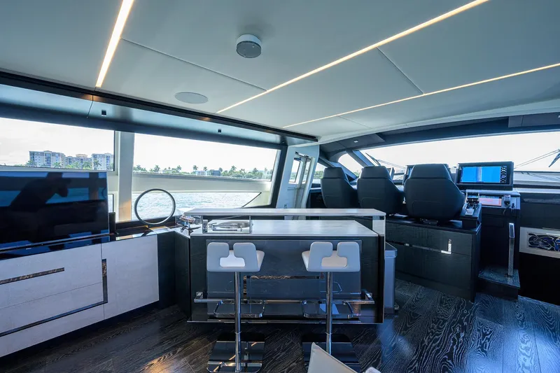 Slide: The Image of Luxurious interior of 2022 Pershing 9X yacht with elegant seating and ocean view. - 39