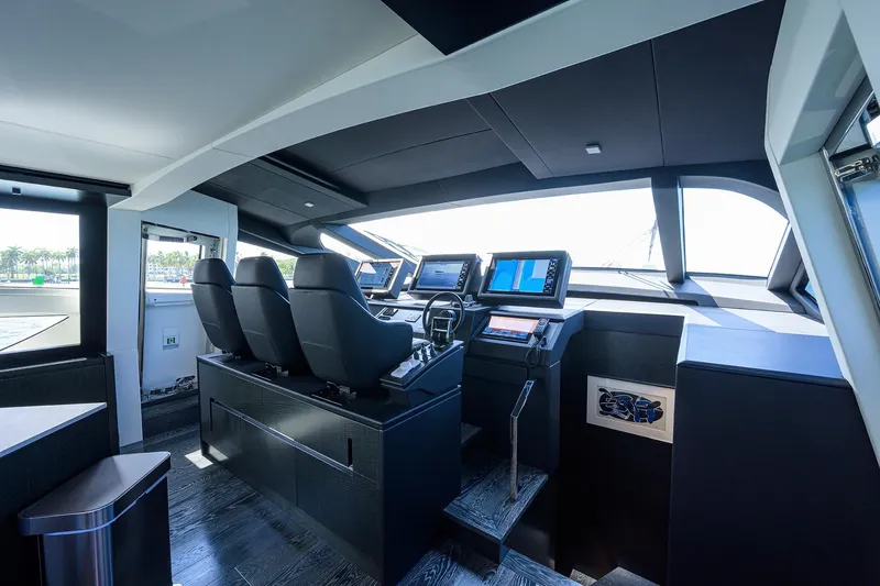 Slide: The Image of Luxurious interior of 2022 Pershing 9X yacht with elegant seating and panoramic ocean views. - 41