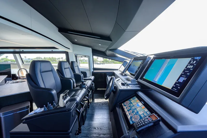 Slide: The Image of Luxurious interior of 2022 Pershing 9X yacht with elegant seating and ocean view. - 42