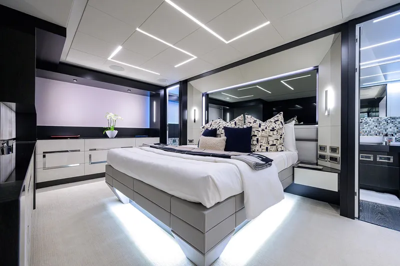 Slide: The Image of Luxurious interior of 2022 Pershing 9X yacht with modern seating and navigation area. - 46