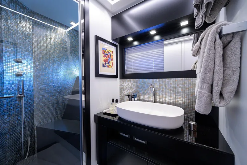 Slide: The Image of Luxurious bathroom interior on 2022 Pershing 9X yacht, featuring modern design and sleek fixtures. - 65