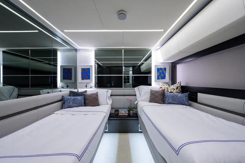 Slide: The Image of Luxurious 2022 Pershing 9X yacht bedroom with modern design and elegant lighting. - 67