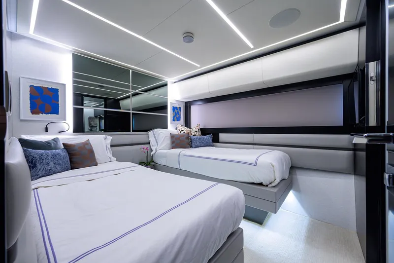 Slide: The Image of Luxurious interior of 2022 Pershing 9X yacht with modern seating and elegant decor. - 70