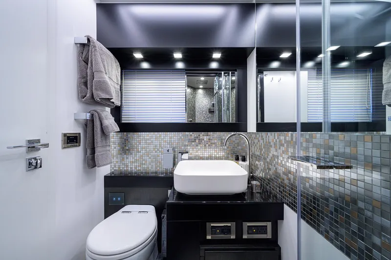 Slide: The Image of Luxurious bathroom on 2022 Pershing 9X yacht with modern design and elegant fixtures. - 72