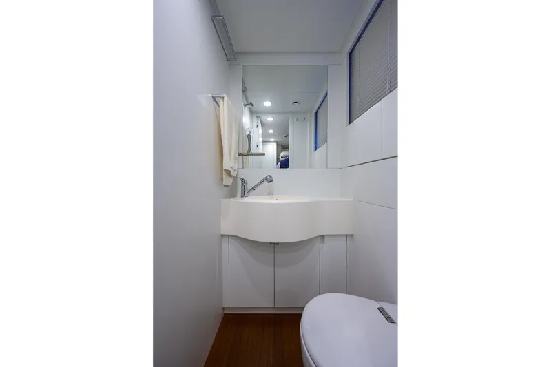 Slide: The Image of Luxurious bathroom in 2022 Pershing 9X yacht with modern fixtures and mosaic tiles. - 79