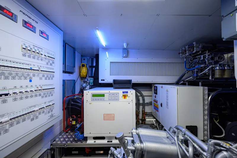 Slide: The Image of Modern kitchen interior on 2022 Pershing 9X yacht with sleek design and bunk beds. - 82