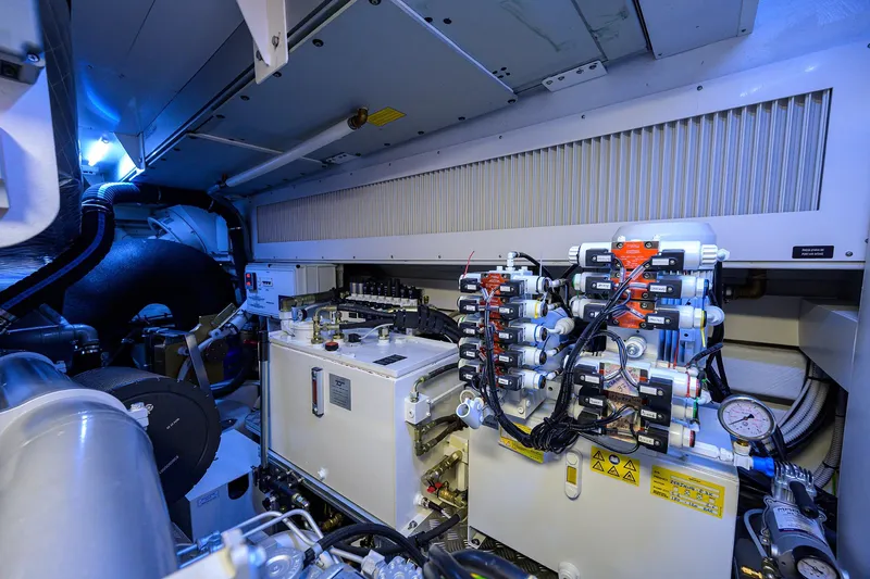 Slide: The Image of Bunk beds in 2022 Pershing 9X yacht cabin, featuring modern design and cozy bedding. - 85