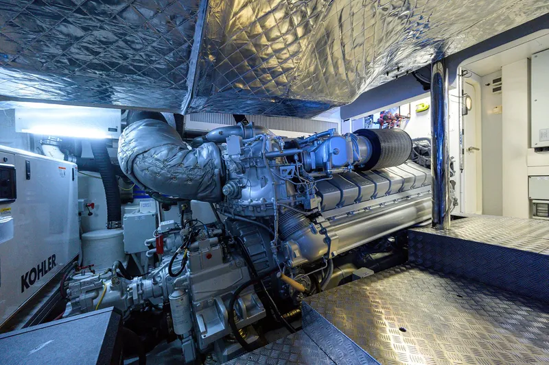 Slide: The Image of Engine room of 2022 Pershing 9X yacht with advanced machinery and insulation. - 98