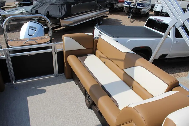 Slide: The Image of 2026 Avalon Venture 85 Quad Lounger, 23 FT, featuring luxurious tan and white seating. - 14