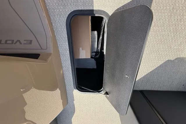 Slide: The Image of Open storage compartment in 2026 Evotti EVOTTI 523CS vehicle interior. - 19
