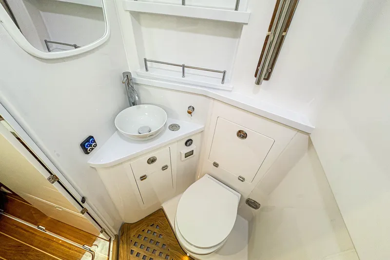 Slide: The Image of Luxurious bathroom in 2026 HCB 48 Campeon boat, featuring modern fixtures and elegant design. - 28