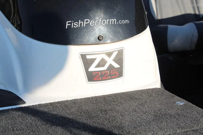 Slide: The Image of 2011 Skeeter ZX225 boat with FishPerform.com decal on the console. - 13