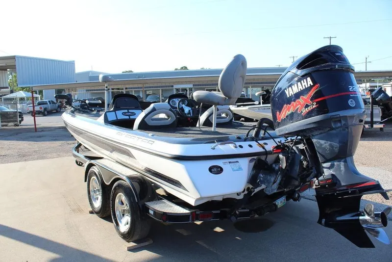 Slide: The Image of 2011 Skeeter ZX225 boat with Yamaha VMAX engine, parked on a trailer. - 5