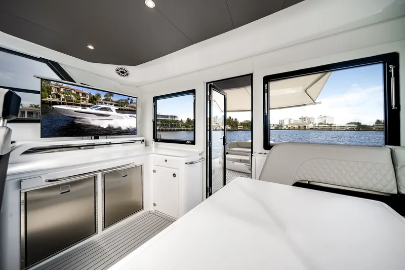 Slide: The Image of Interior of a luxury yacht with modern amenities and a view of the water. - 30