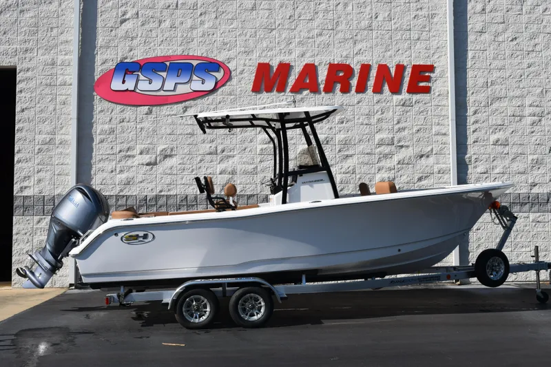 The Image of 2026 Sea Hunt Ultra 229 boat on trailer at GSPS Marine dealership. - 1