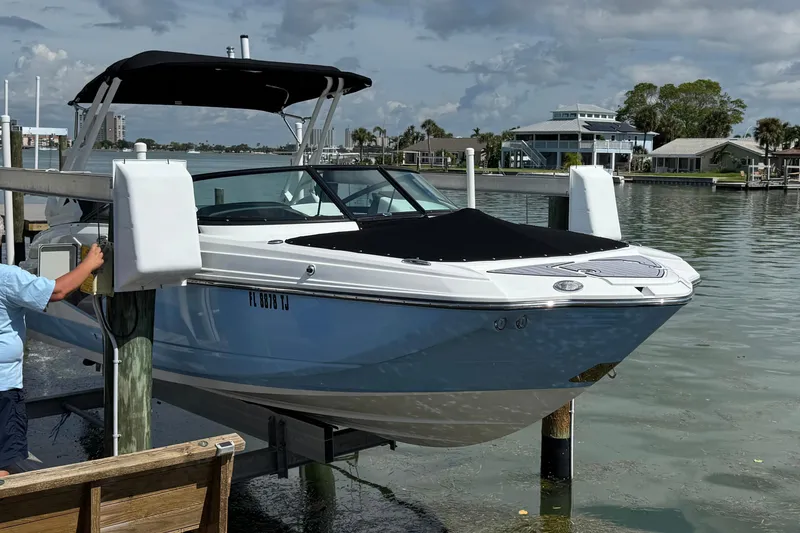 The Image of 2023 Monterey M-45 boat docked at marina with scenic waterfront view. - 0