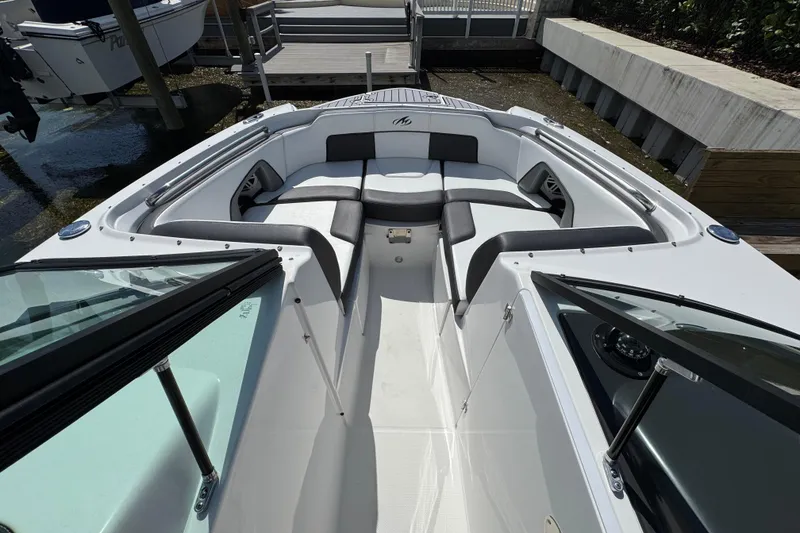 Slide: The Image of 2023 Monterey M-45 boat interior with sleek seating and modern design. - 10