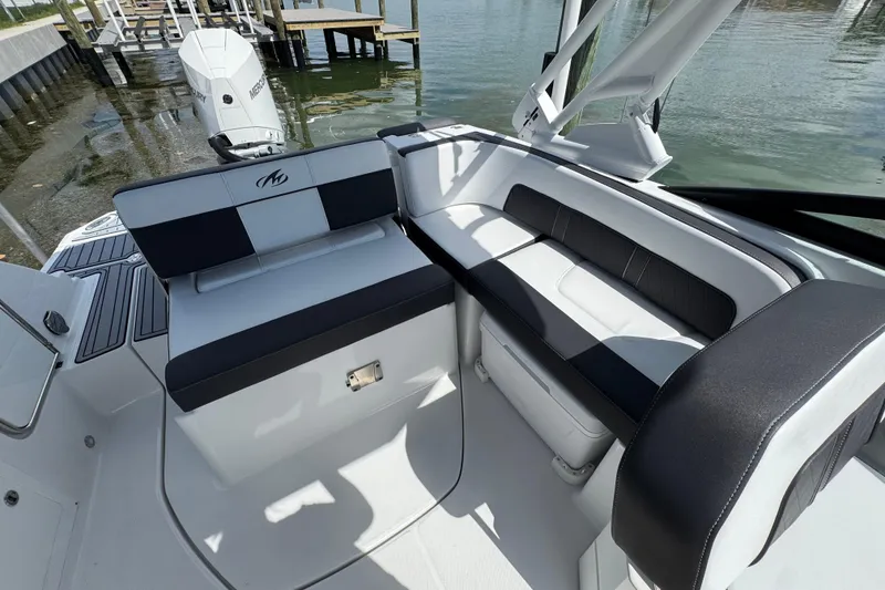 Slide: The Image of 2023 Monterey M-45 boat interior with sleek seating and modern design. - 16