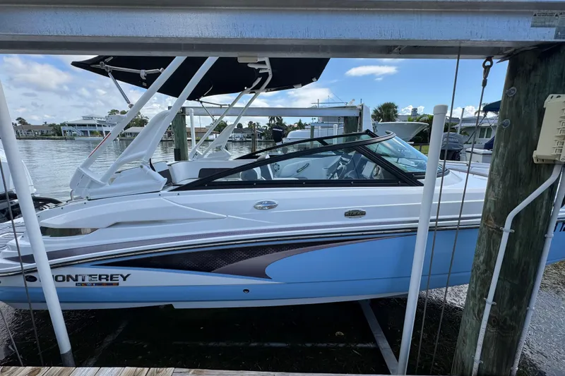 Slide: The Image of 2023 Monterey M-45 boat docked, featuring sleek design and modern features. - 17