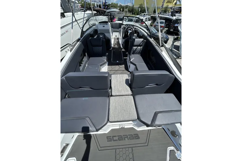 Slide: The Image of 2023 Scarab 255 ID boat interior with spacious seating and modern design. - 11