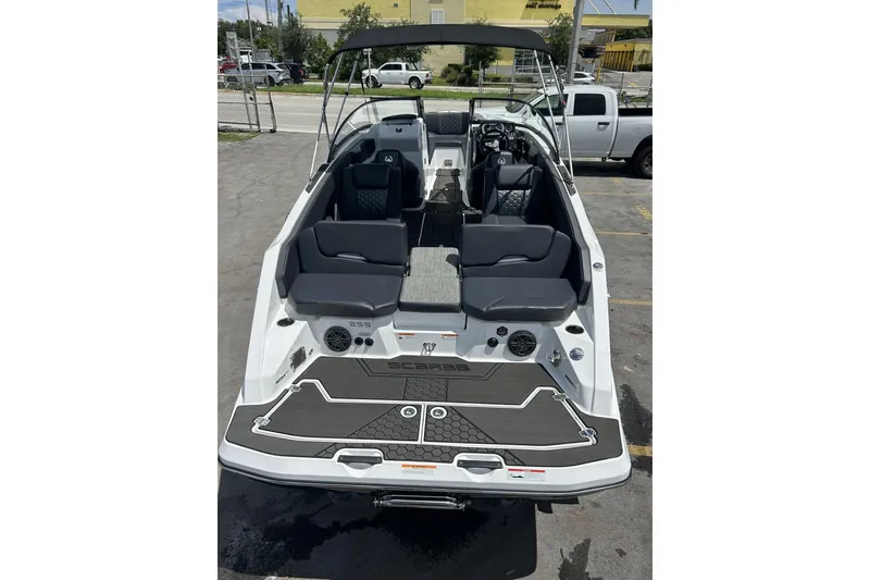Slide: The Image of 2023 Scarab 255 ID boat with sleek seating and modern design. - 32