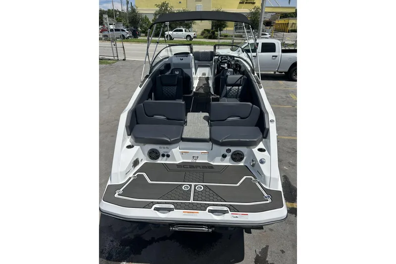 Slide: The Image of 2023 Scarab 255 ID boat with sleek interior and modern design. - 57