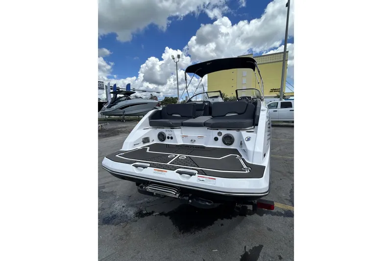 Slide: The Image of 2023 Scarab 255 ID boat, rear view, showcasing sleek design and spacious seating. - 62