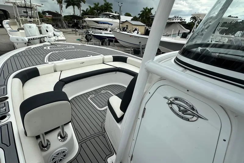 Slide: The Image of 2021 Tidewater 2500 Carolina Bay boat with sleek seating and modern design. - 4