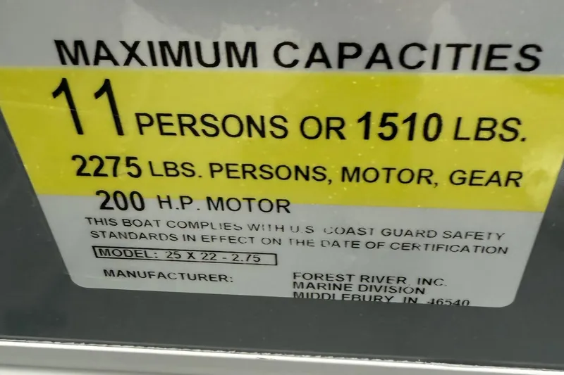 Slide: The Image of 2025 Berkshire 22RFX CTS boat capacity label: 11 persons, 1510 lbs, 200 HP motor. - 15