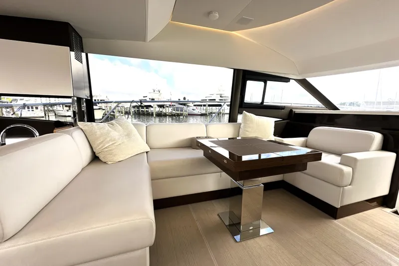 Slide: The Image of Luxurious interior of 2023 Prestige 520 yacht with elegant seating and modern design. - 45