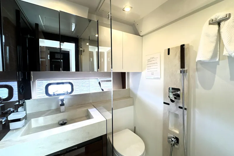 Slide: The Image of Luxurious bathroom in 2023 Prestige 520 yacht with modern fixtures and elegant design. - 62