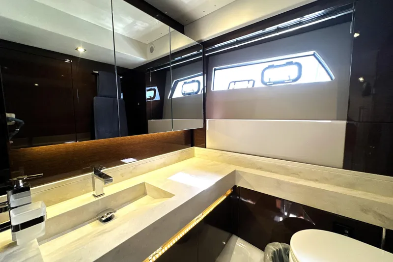 Slide: The Image of Luxurious bathroom interior of 2023 Prestige 520 yacht with modern fixtures and sleek design. - 73