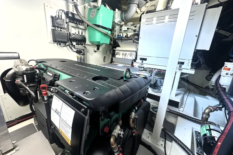 Slide: The Image of Engine room of 2023 Prestige 520 yacht, showcasing advanced machinery and components. - 75