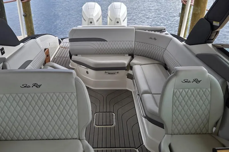 Slide: The Image of 2023 Sea Ray SLX 280 Outboard interior with luxurious seating and elegant design. - 3